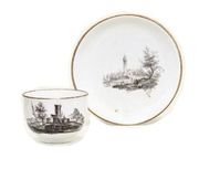 A FULDA TEACUP AND SAUCER