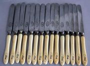 15 Cheese Knives, 19th century.