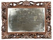 Continental carved walnut mirror