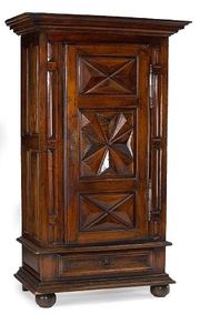 A Louis XIV walnut bonnetiere 