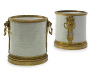 A PAIR OF LOUIS XIV ORMOLU-MOUNTED CHINESE CARVED CELADON PORCELAIN BRUSHPOTS
T