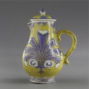 A CHINESE EXPORT 'PRONK PLUME' MILK JUG AND COVER
CIRCA 1740
