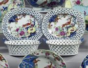 A PAIR OF CHINESE EXPORT 'TOBACCO LEAF' PATTERN RETICULATED OVAL BASKETS