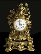 A Louis XV Style Ormulu Clock