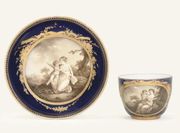 A MEISSEN (MARCOLINI) BLUE-GROUND SMALL COFFEE-CUP AND SAUCER