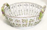 A GERA TWO-HANDLED PIERCED BASKET