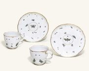 A PAIR OF NYMPHENBURG TEACUPS AND SAUCERS