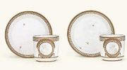 TWO FULDA WHITE AND GILT PORTRAIT COFFEE-CUPS AND SAUCERS