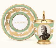 A BERLIN GREEN-GROUND IMPERIAL PORTRAIT CABINET-CUP AND SAUCER