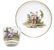 A GOTHA COFFEE-CUP AND SAUCER