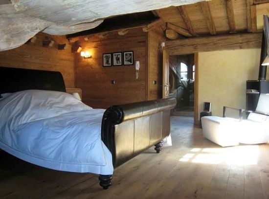 A bedroom in an old luxury chalet